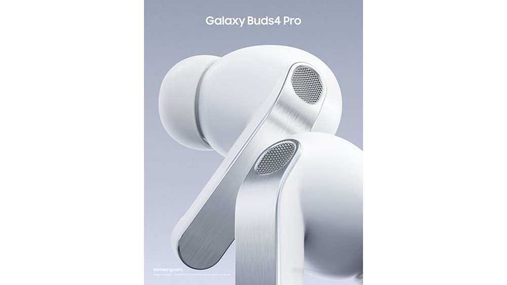 Close-up of the silver stems and speaker grilles on white Samsung Galaxy Buds4 Pro earbuds