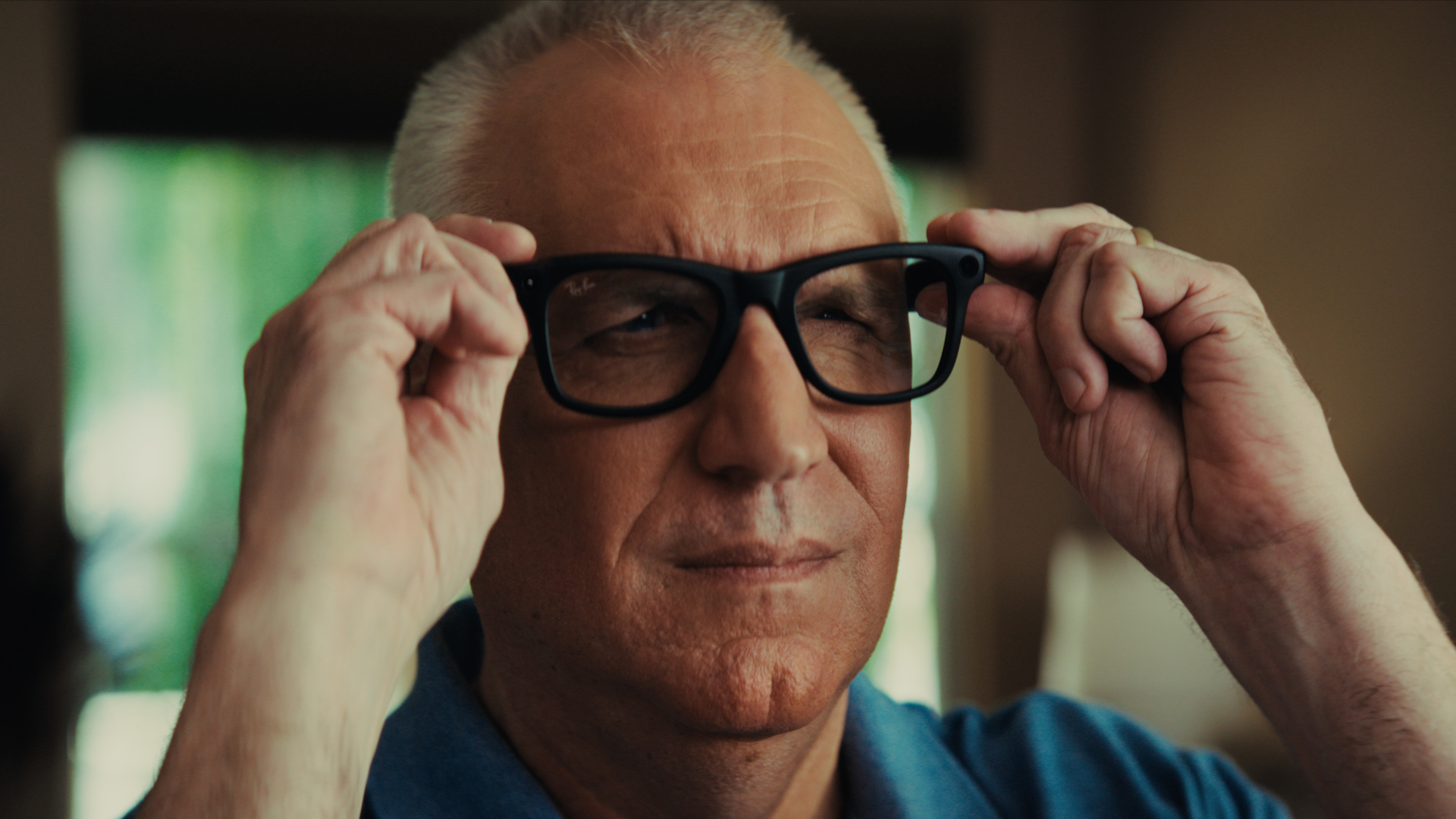 A legally blind veteran putting on Ray-Ban Meta AI glasses